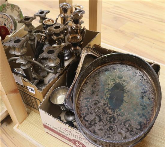 A quantity of silver plate: including a pair of candlesticks, two plated candelabra etc.